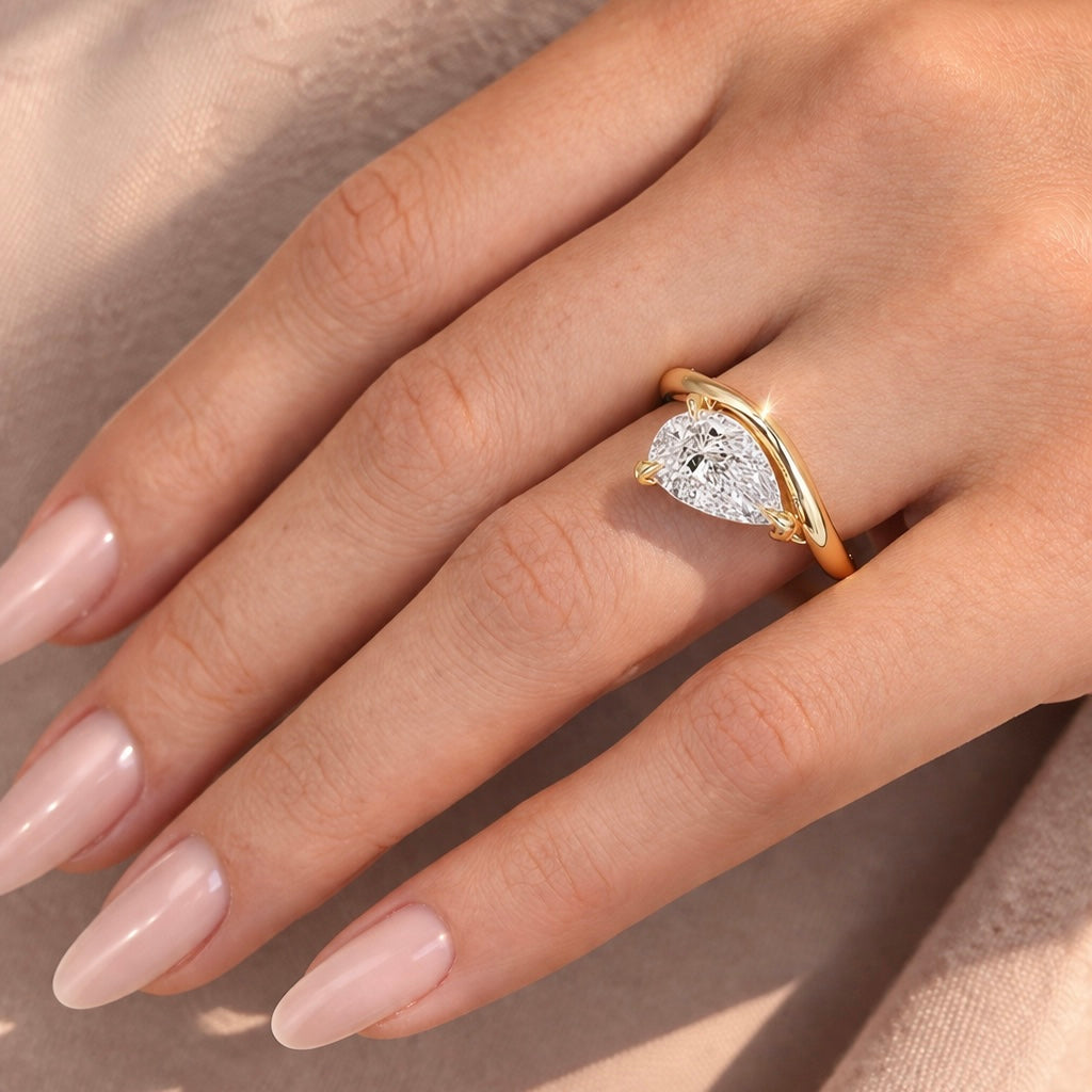 Pear Cut Lab grown Solitaire Wave Engagement Ring